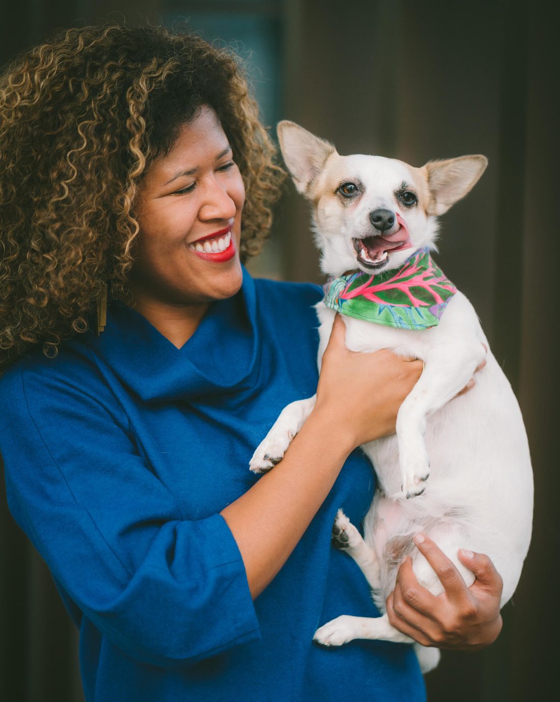Meris E. Stone holding her dog